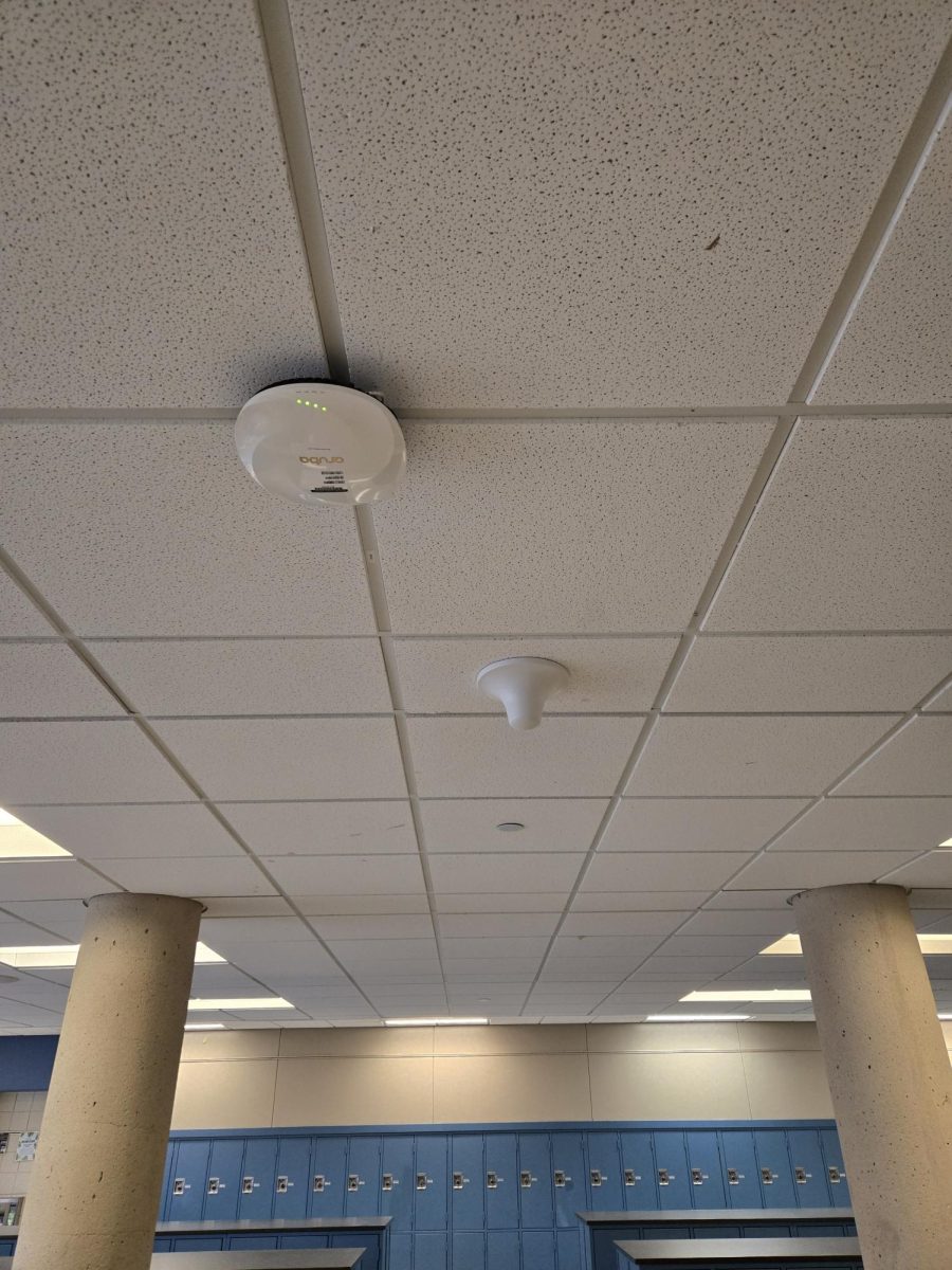 Students and staff access the Internet through wifi access points (left), while the cone-shaped devices (right) are boosters for the radios staff members use. 
