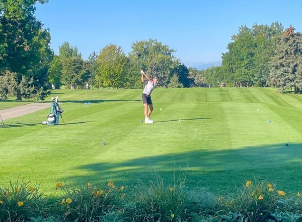 Freshman Judd Nikkel tees off at hole 1 at Highland Hills Golf Course in Greeley on Sept. 15.
