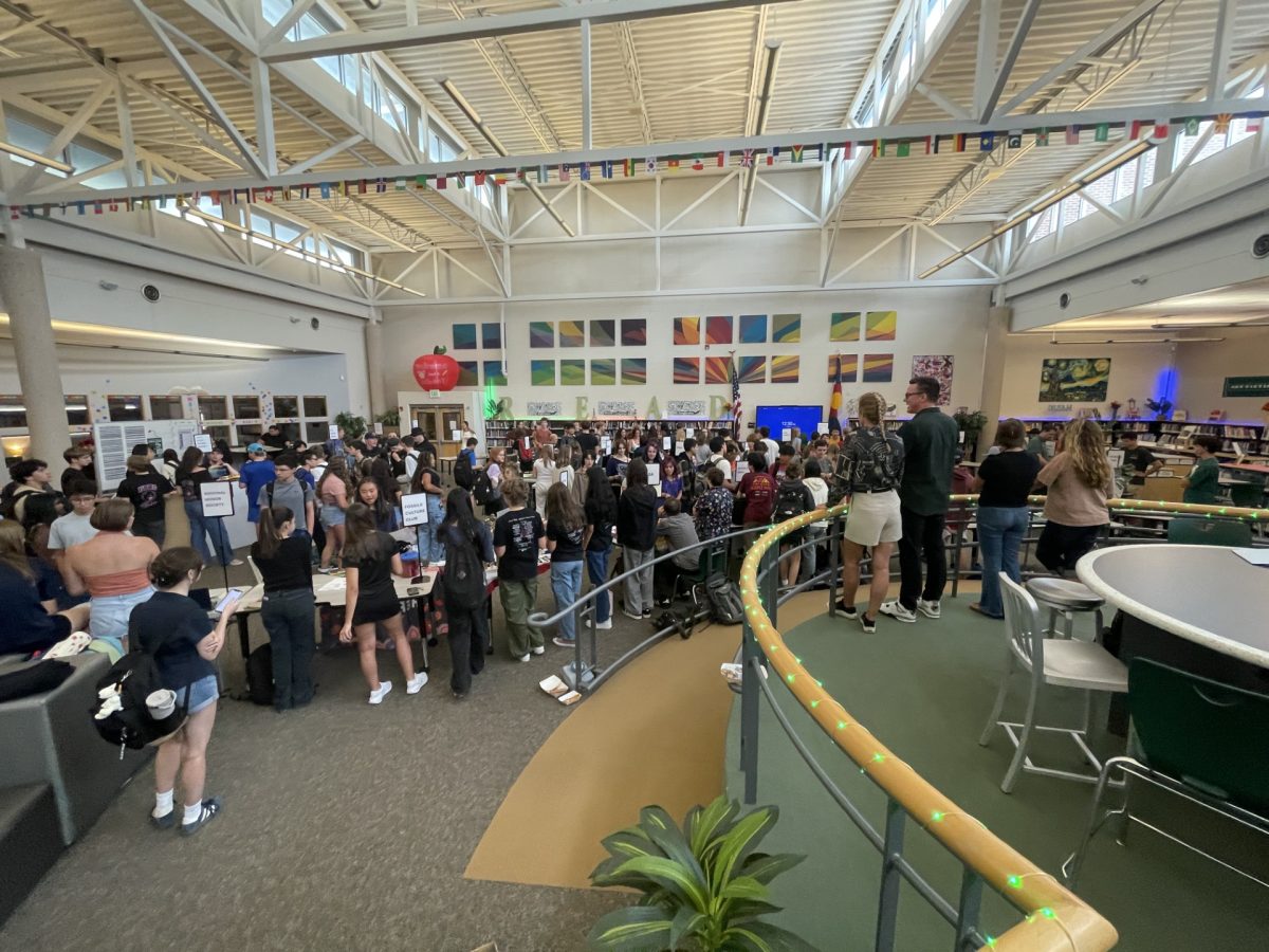 Students look for a club to join during Thursday’s event in the media center.