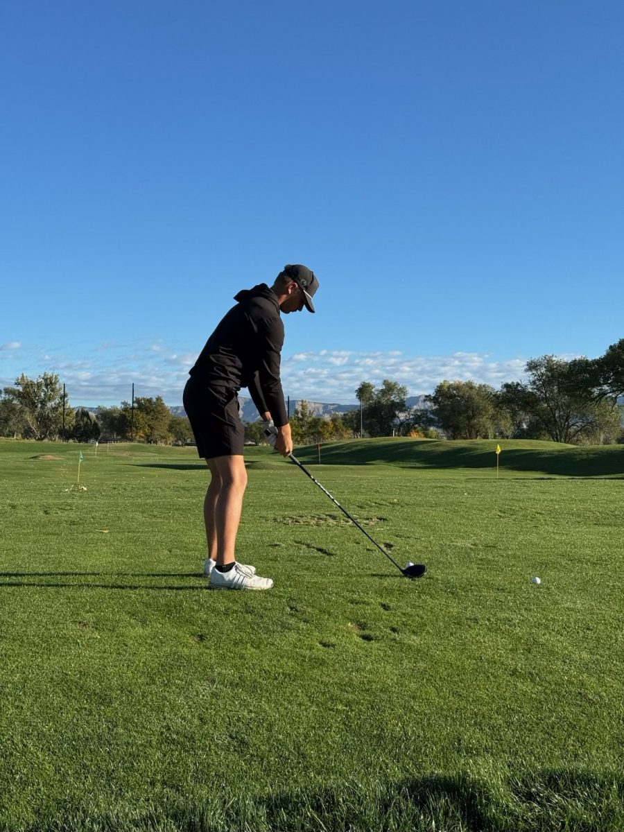 Junior Jonah Kent prepares for a round during the state tournament Oct. 6-7 in Grand Junction. 
 
