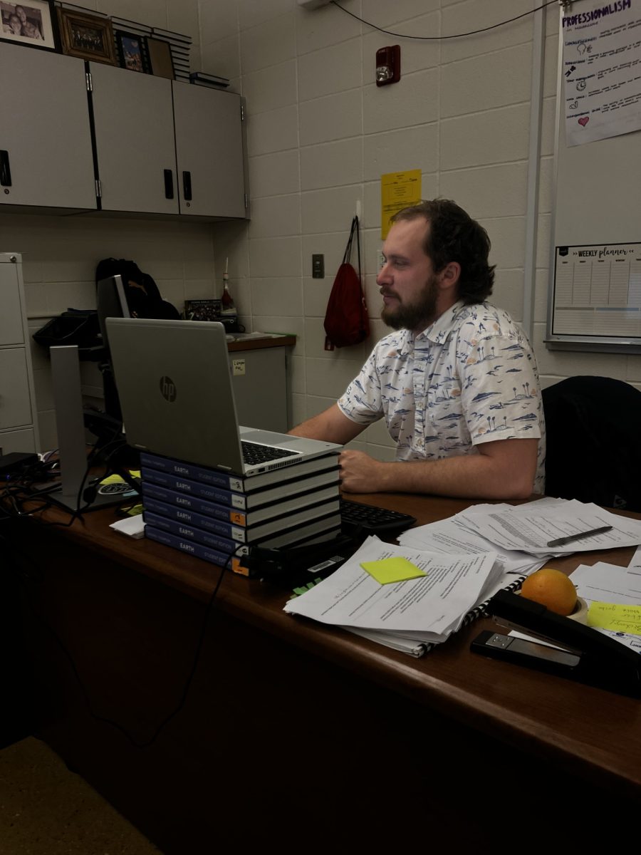 New Fossil science teacher Andrew Gysin works on grading tests