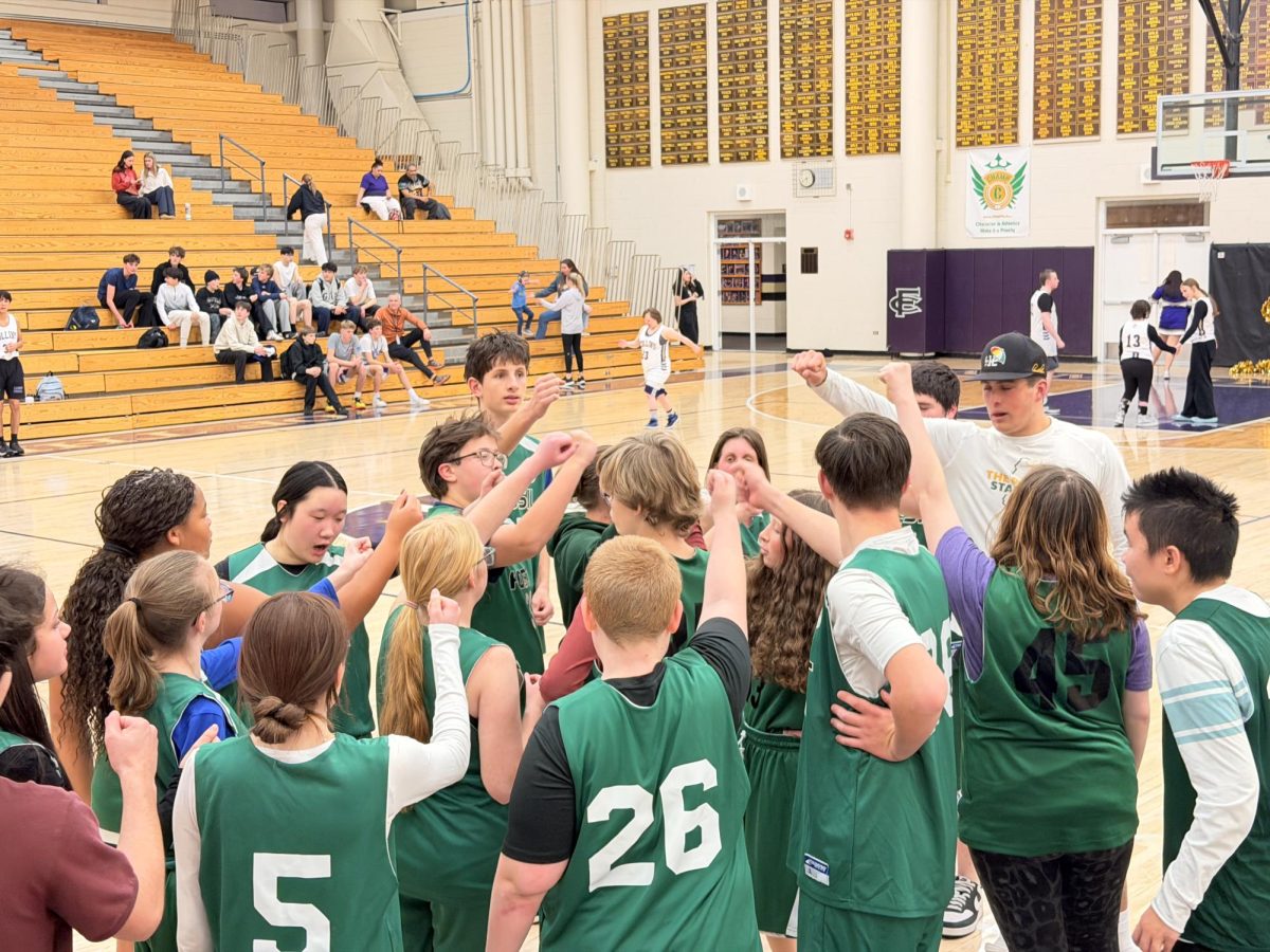 Fossil players break out of their huddle.