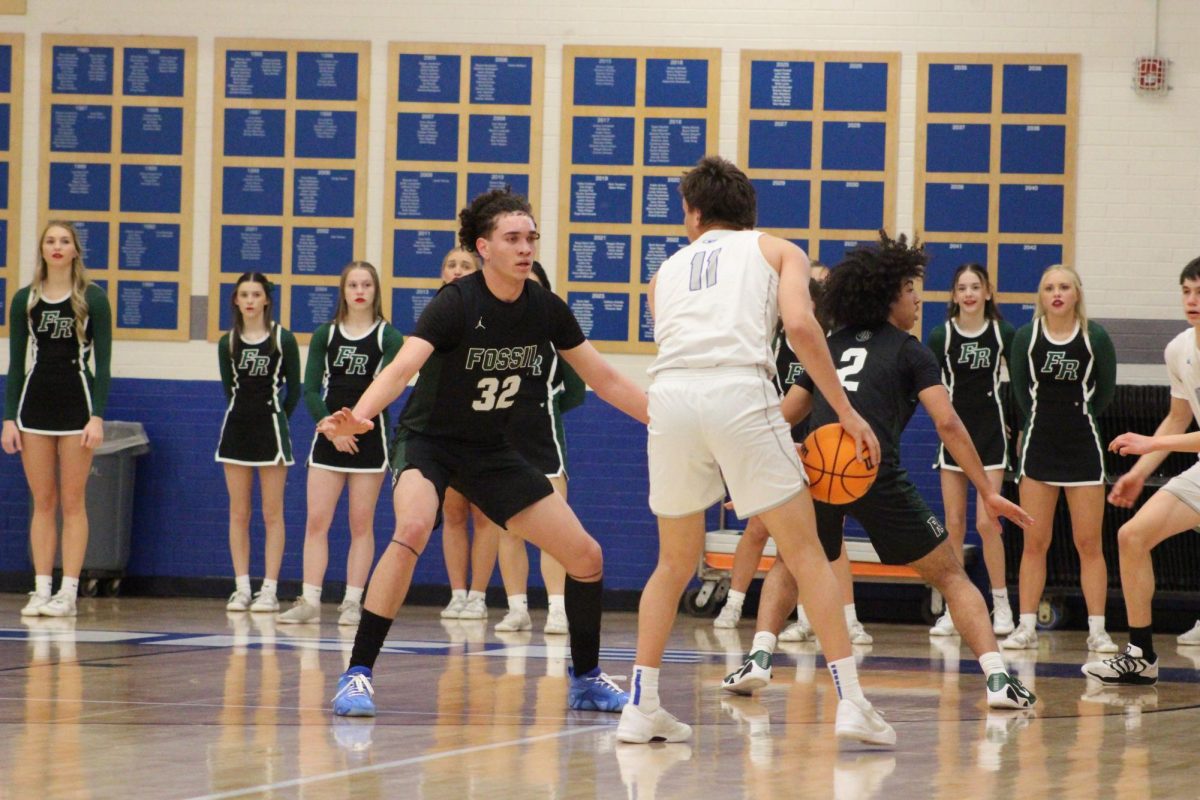 Malachi Egbuji sets up on the other end to guard his man against Poudre on Janurary 23, 2026 at Poudre high school.