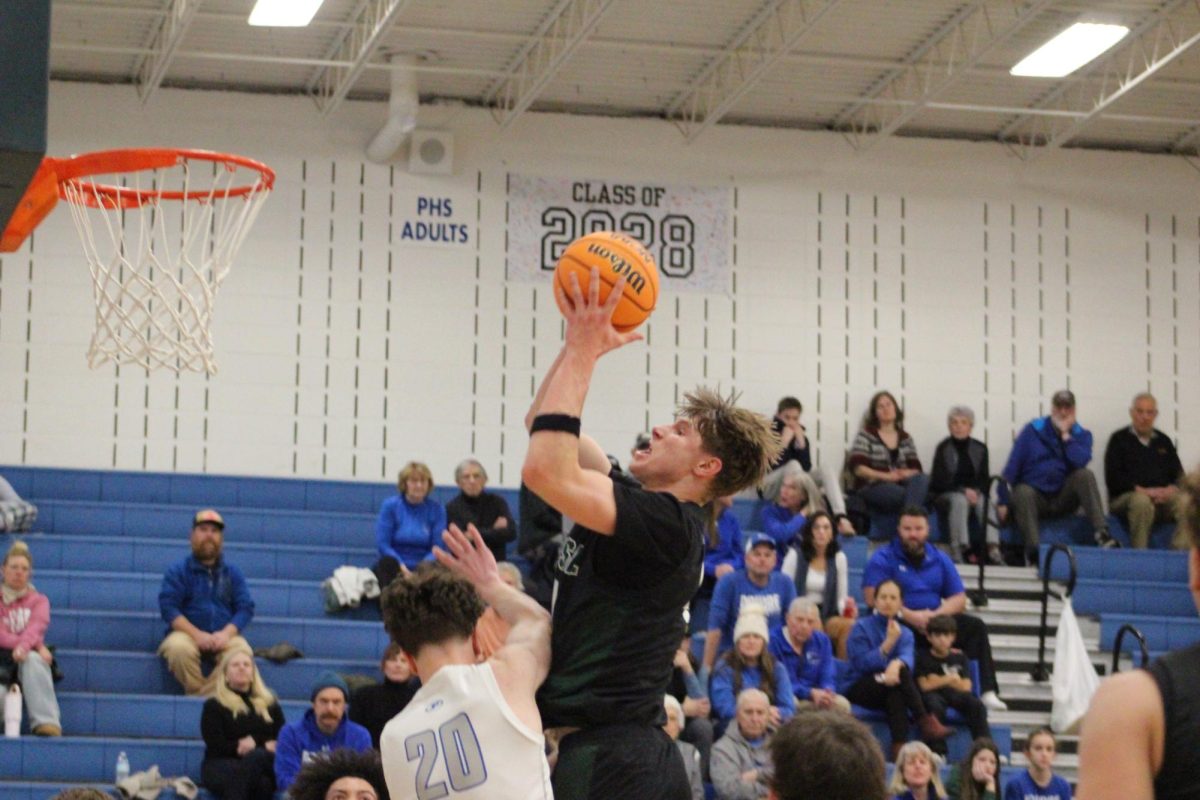 Vander Eberhard rises up to take on a shooting foul against Poudre on January 23, 2026 at Poudre high school.
