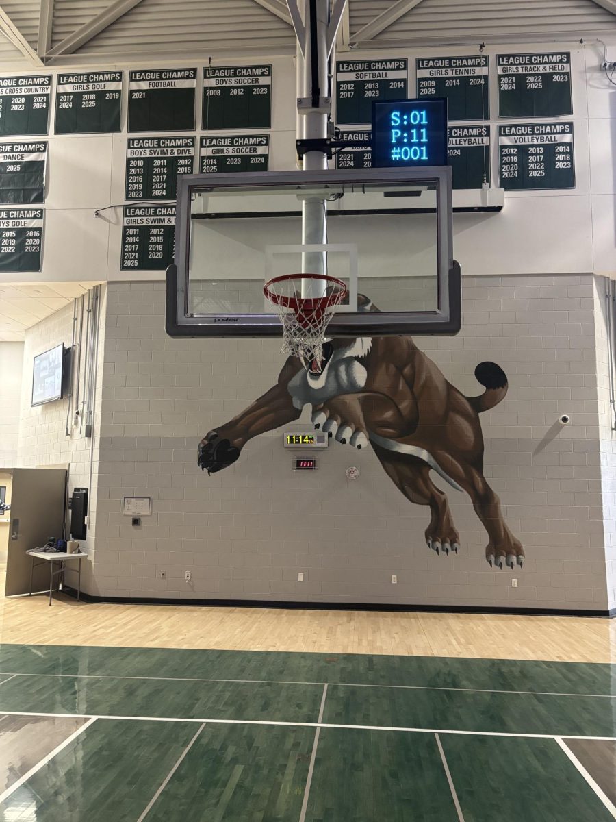 New shot clock placed above the backboard on main court in the gym at Fossil Ridge High School on March 31, 2026