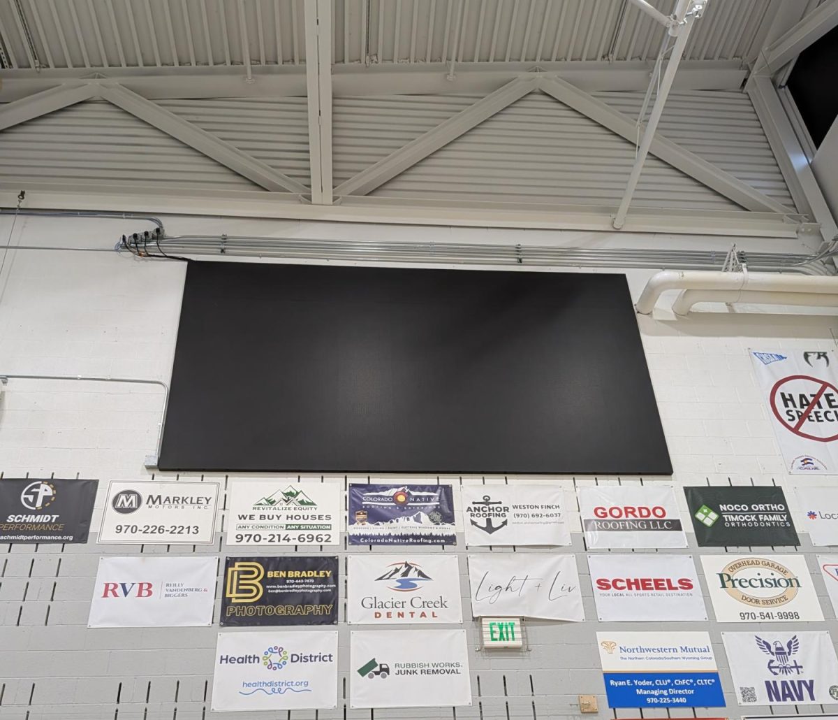 Fully finished scoreboard on the west wall of the gym at Fossil Ridge High School on March 24, 2026.
