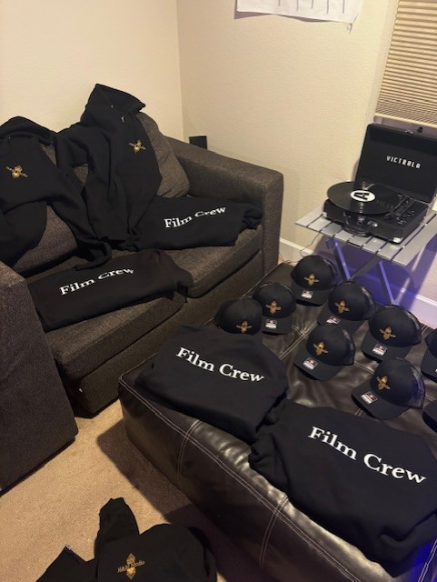 Some of H&M Media's film supplies and company merch that they use to promote branding. 