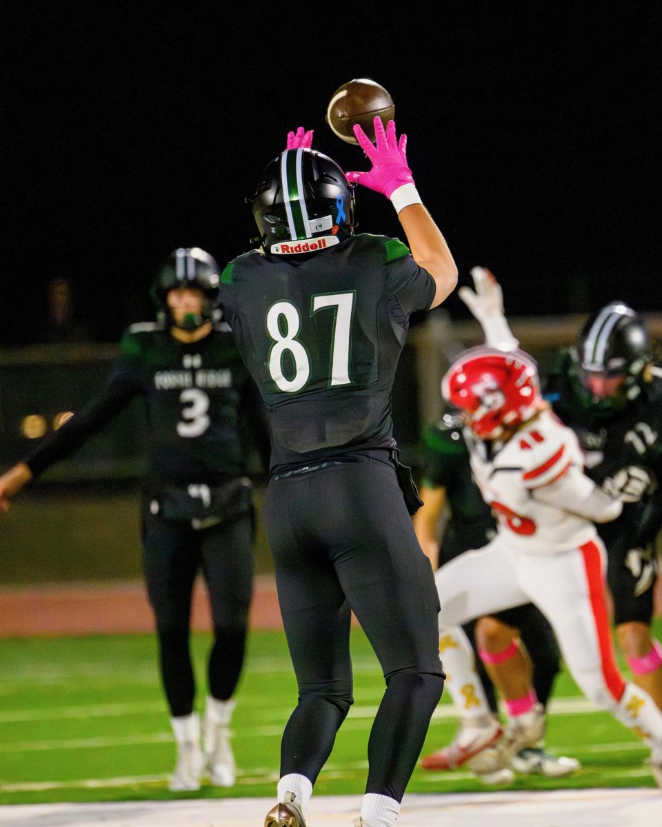 Caleb Camping catching a pass in a game from his Junior season. 